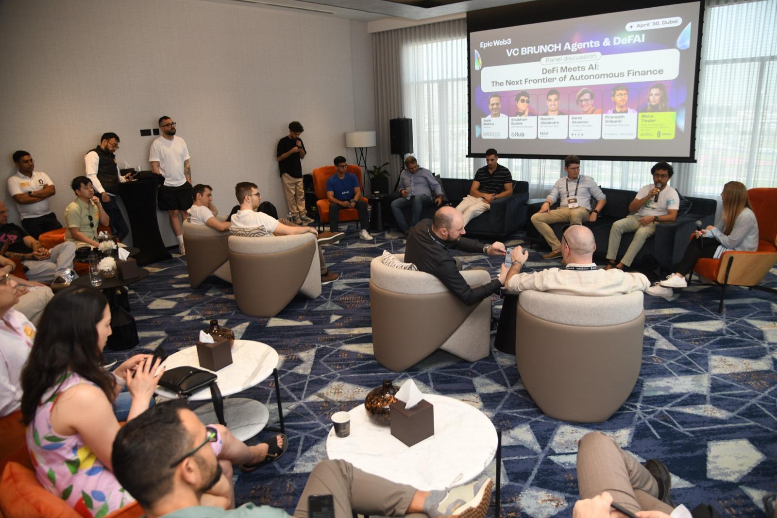 Attendees seated in a lounge setting for a discussion session at Agents Day